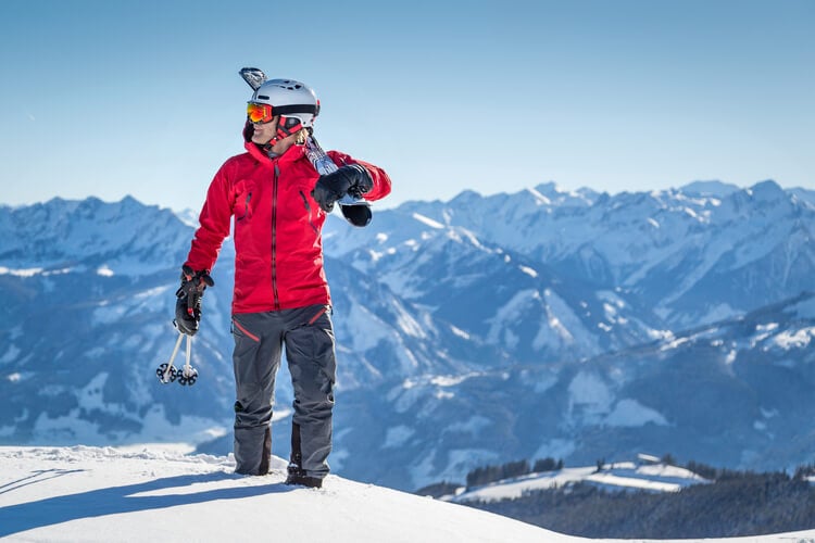 A man in ski gear on a mountain