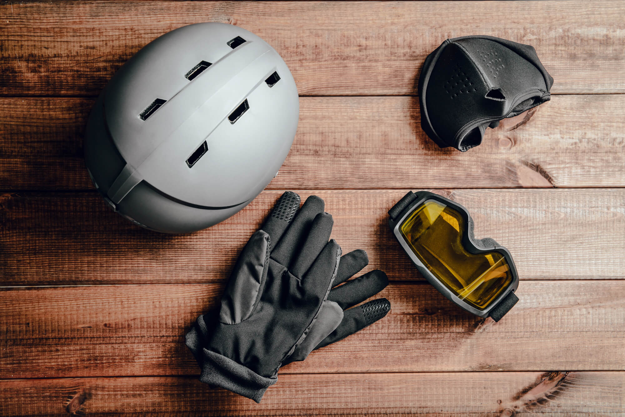 The ultimate ski packing list includes these types of ski equipment including gloves, goggles and helmet