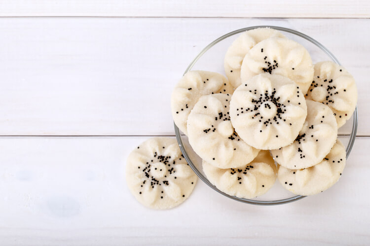 Persian rice cookies or Nan-e-Berenji in a glass bowl