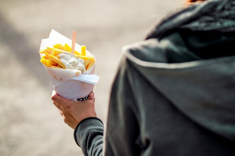 A cone of Belgian frites and mayonnaise