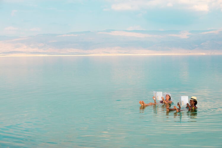 2 women floating the Dead Sea