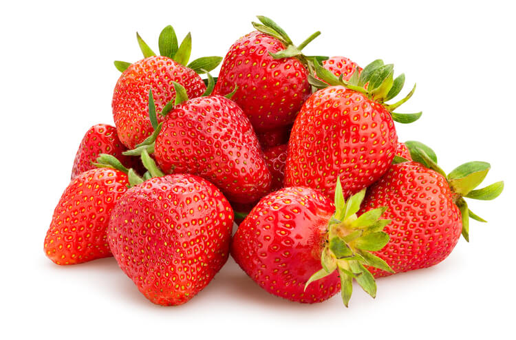 A pile of strawberries on a white background