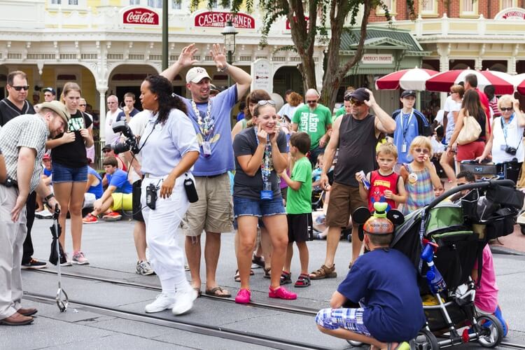photographer at disney and surrounding people
