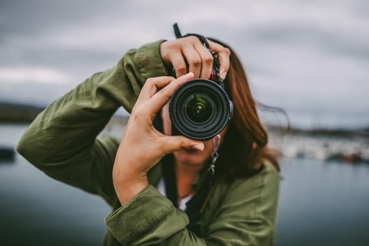 woman holding camera