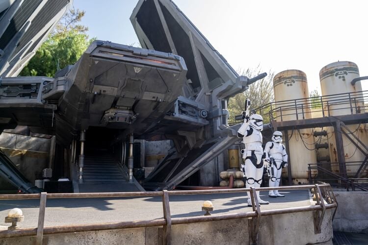 star wars land in disney world stage with two storm troopers