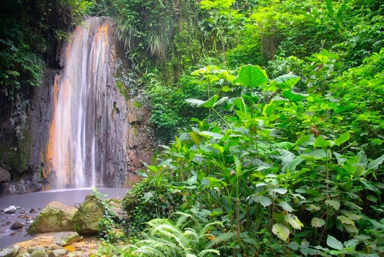 Diamond Falls in St Lucia Botanical Gardens, Soufrière, one of the filming locations for Superman II. 