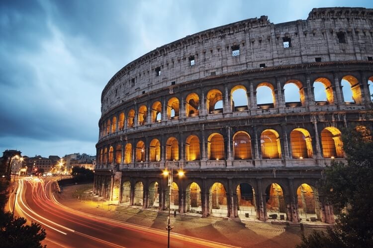 The Colosseum - an ancient amphitheater in Rome at dusk