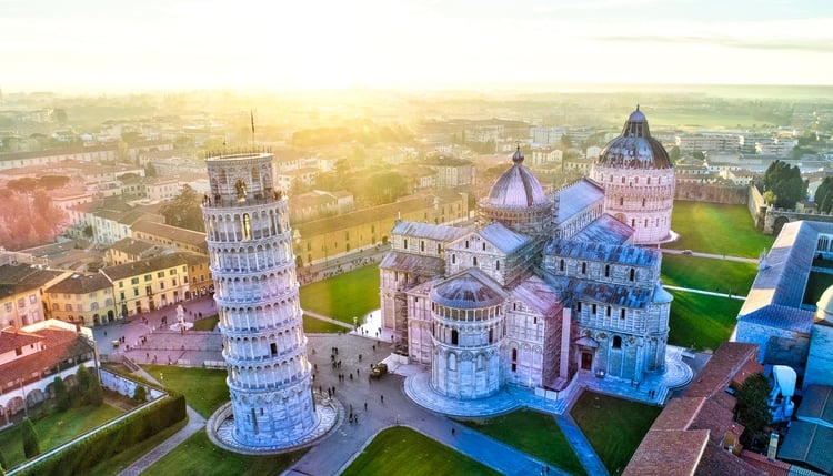 Pisa cathedral and leaning tower at sunset