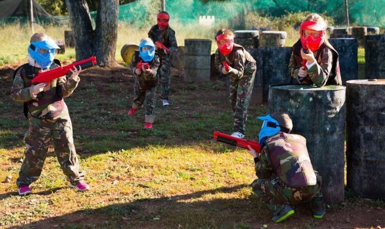 Children with pump-action paint guns.