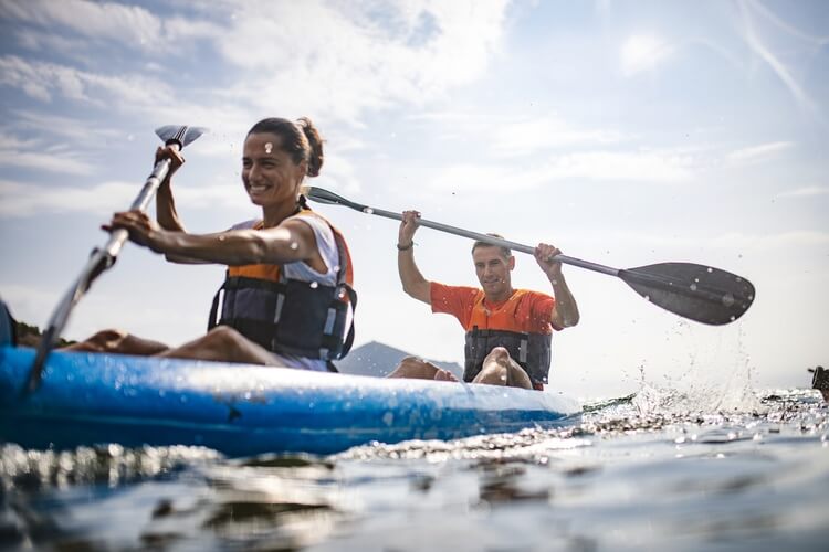 go kayaking in orlando - couple kayaking