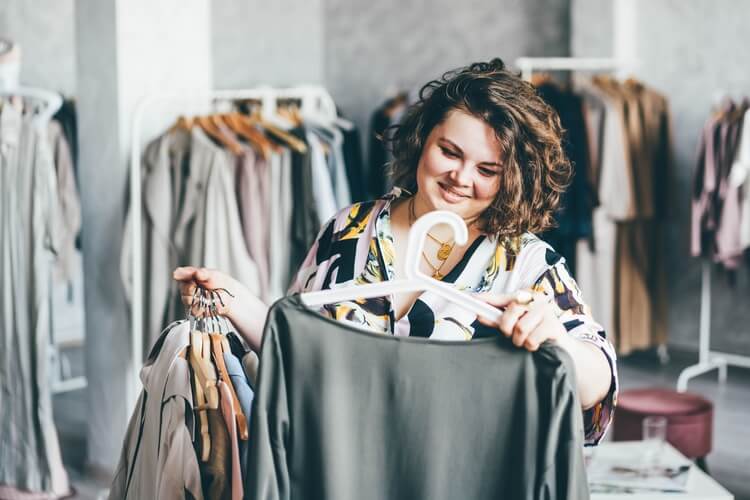 woman looking at clothes