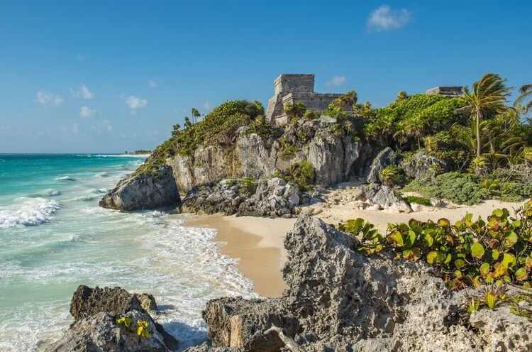 mayan ruins in tulum with beach
