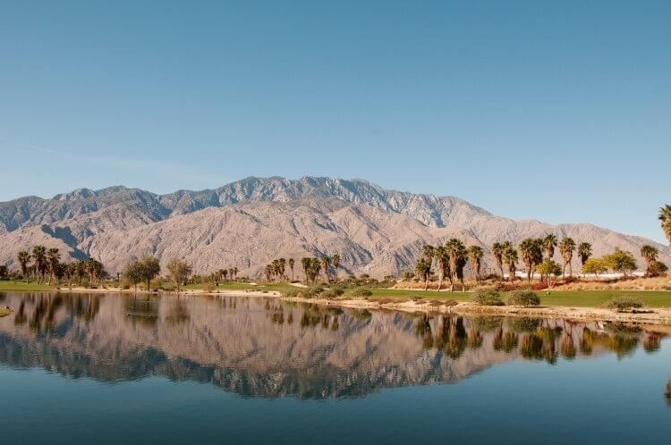 Palm Springs landscape reflected in srtill water