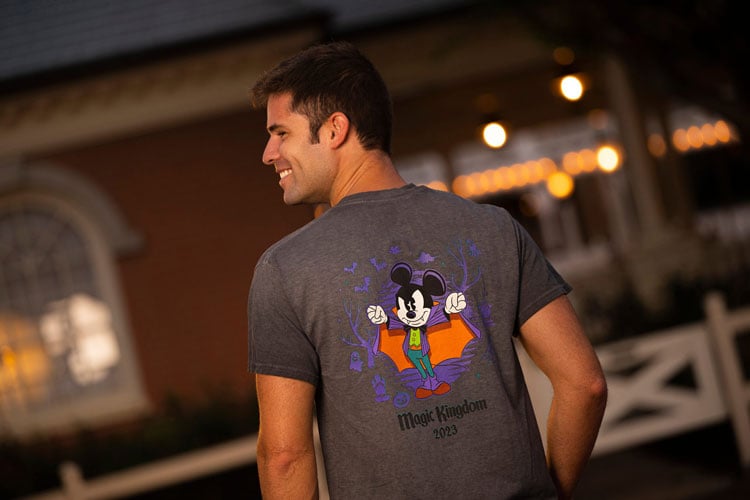 A man wearing a Halloween Disney shirt at the Disney World Halloween event
