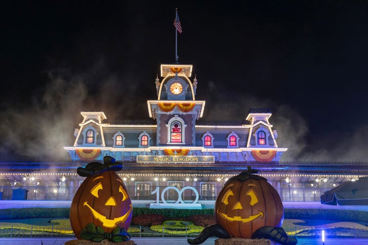 Carved pumpkins in front of a building at the Disney World Halloween event