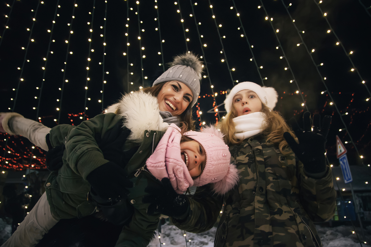 A family enjoying the Christmas lights Orlando events