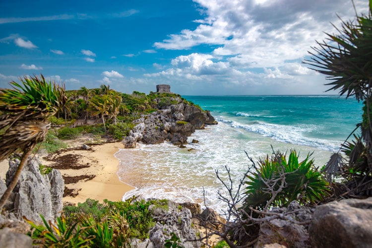 Mayan ruins on the shores of Tulum in Mexico - The best places to visit in August