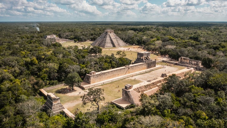 Aerial view of the ruins of Chichen Itza, an ancient Mayan settlement with stone pyramid in the Yucatan Peninsula, a warm place to visit in January