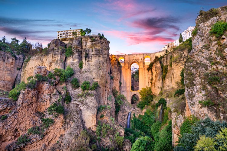 Arched bridge over a deep gorge in Rhonda Andalusia- best places to visit in March