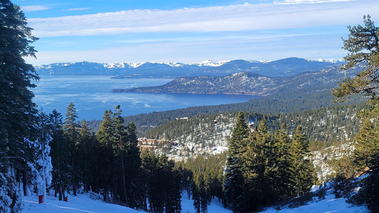 View of mountain and lake landscape in the snow in Lake Tahoe - best places to visit in March