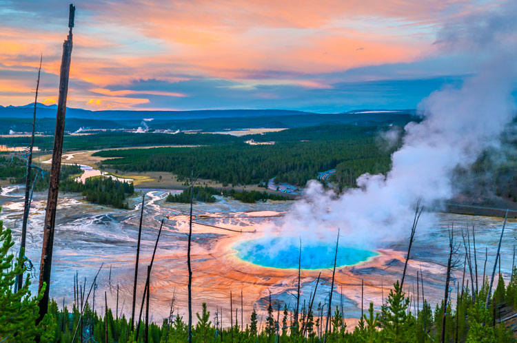 Steaming geyser in Yellowstone National Park - the best places to visit in May